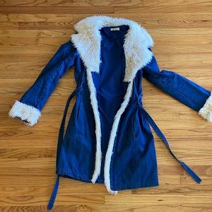 Long denim coat with fur trim